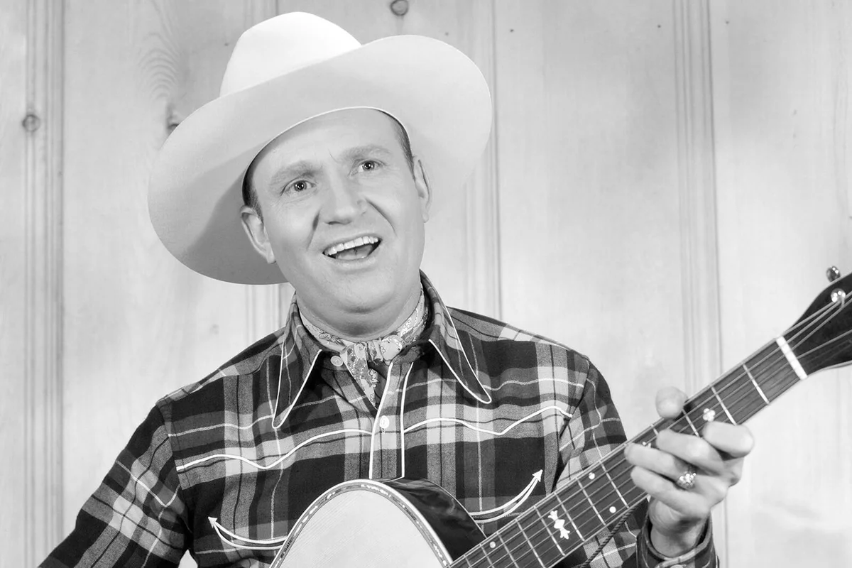 American actor and singer Gene Autry (1907 - 1998) performing with an acoustic guitar, circa 1950 | Getty Editorial Use