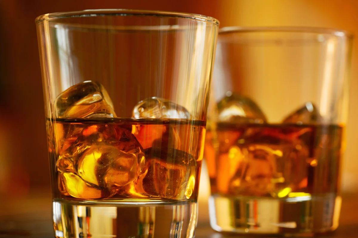 Two glasses of tequila on the rocks