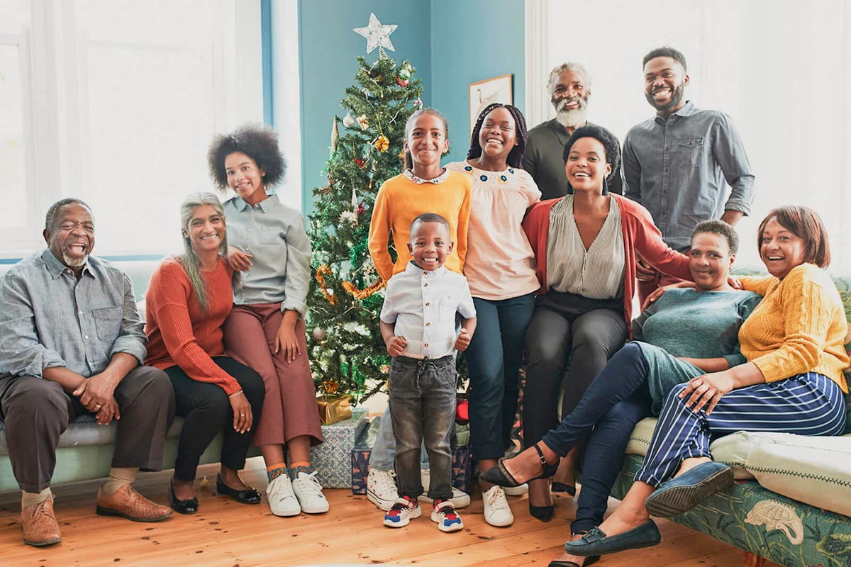 Happy family and friends celebrating Christmas