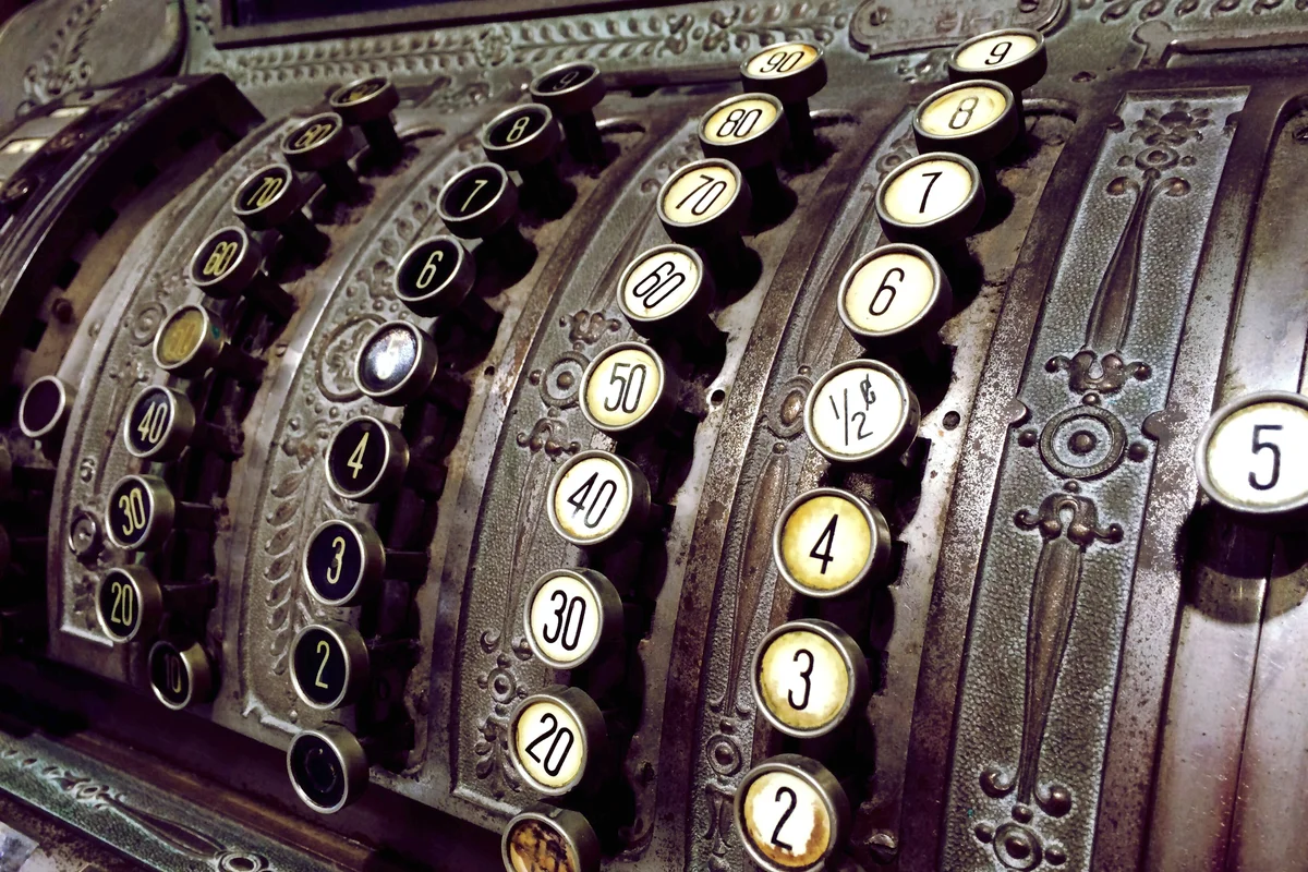 Antique adding machine