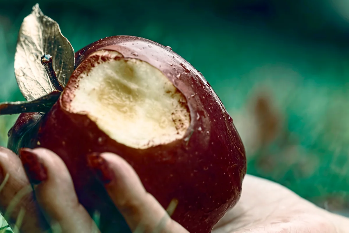 Bitten Apple On Hand