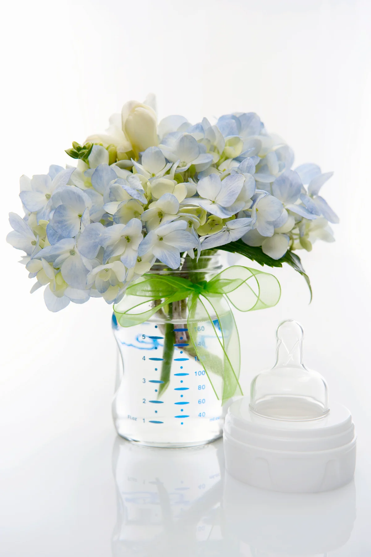 Hydrangea in baby bottle