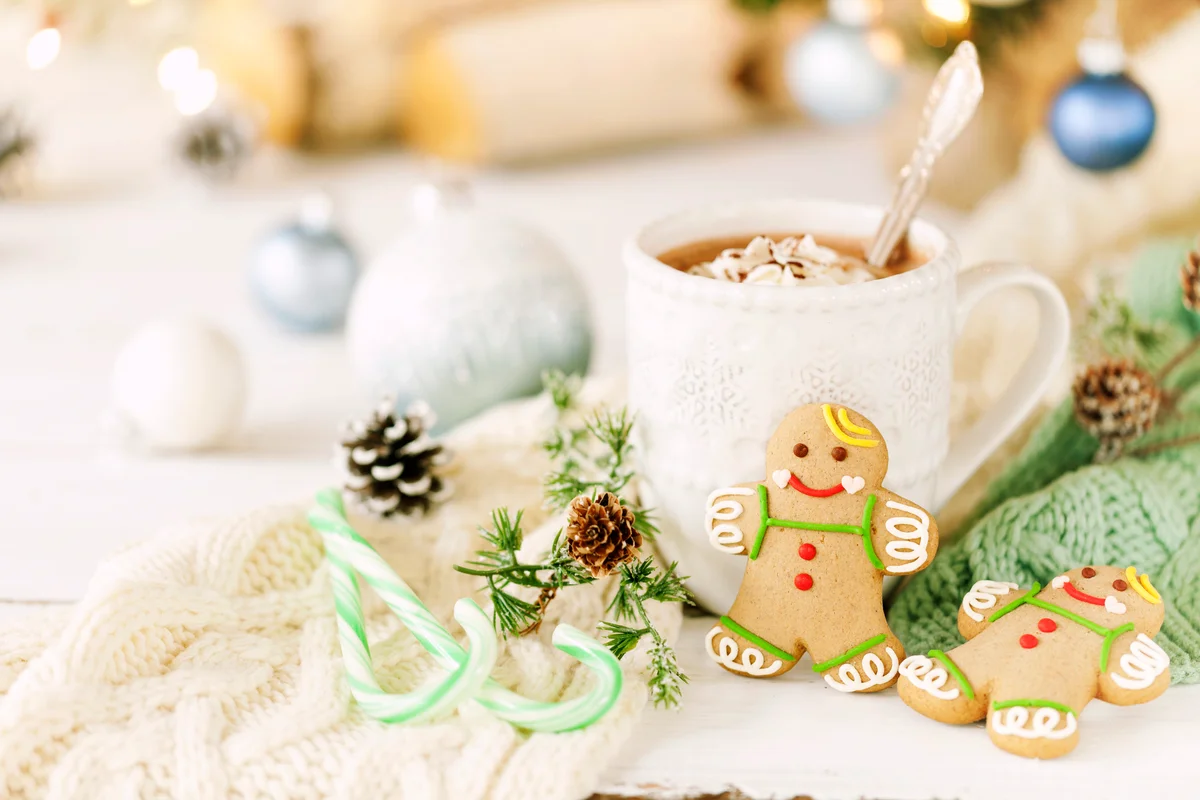 Christmas gingerbread man cookies and hot chocolate