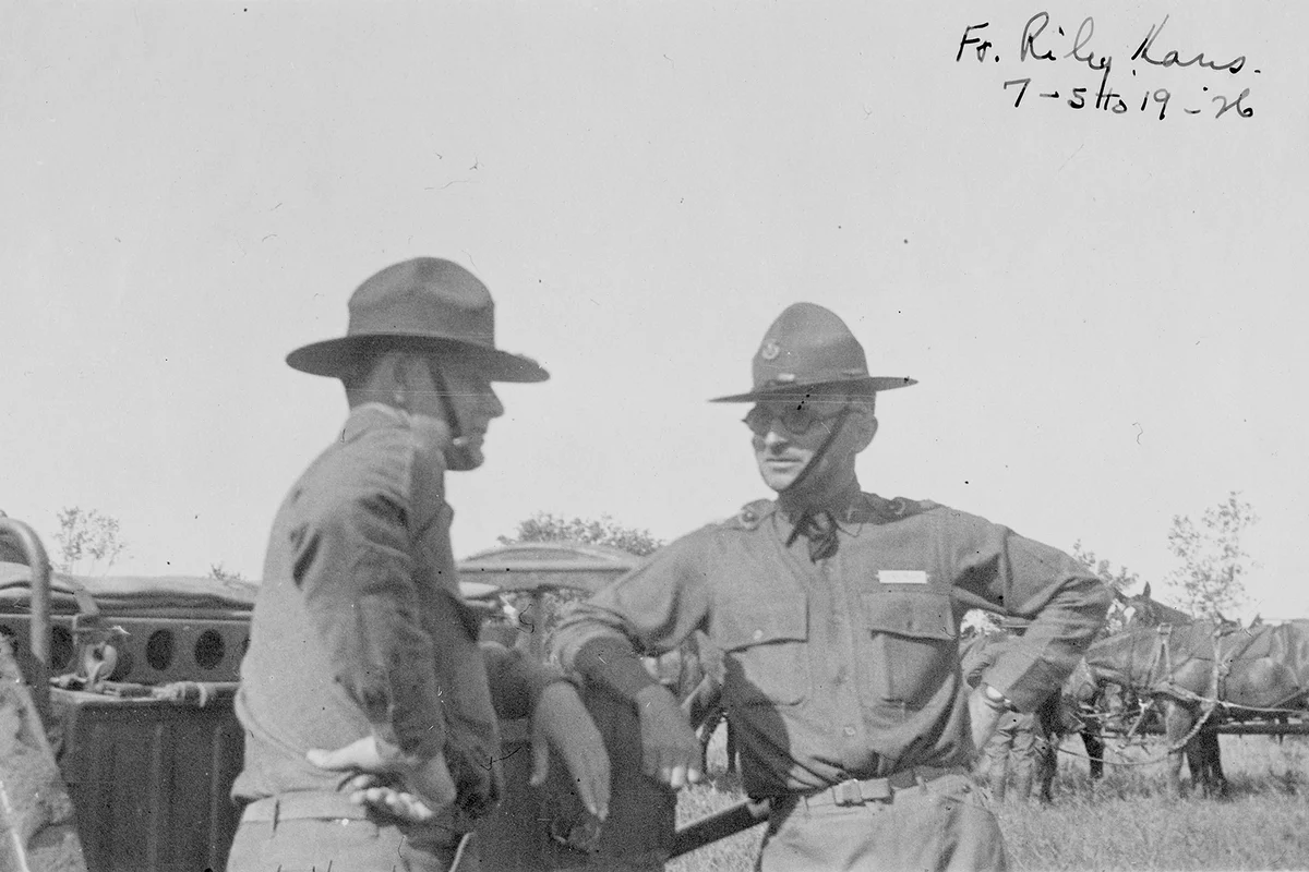 Harry S Truman in military uniform talking to an unidentified soldier at Fort Riley, Kansas, July, 1926