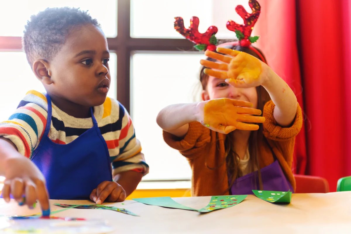 Kids doing homemade decorations for Christmas
