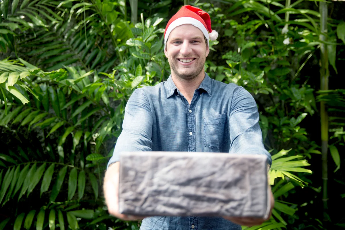 Man giving christmas present
