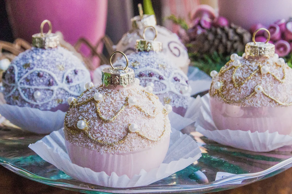 Close-Up Of Baubles Cupcakes On Table