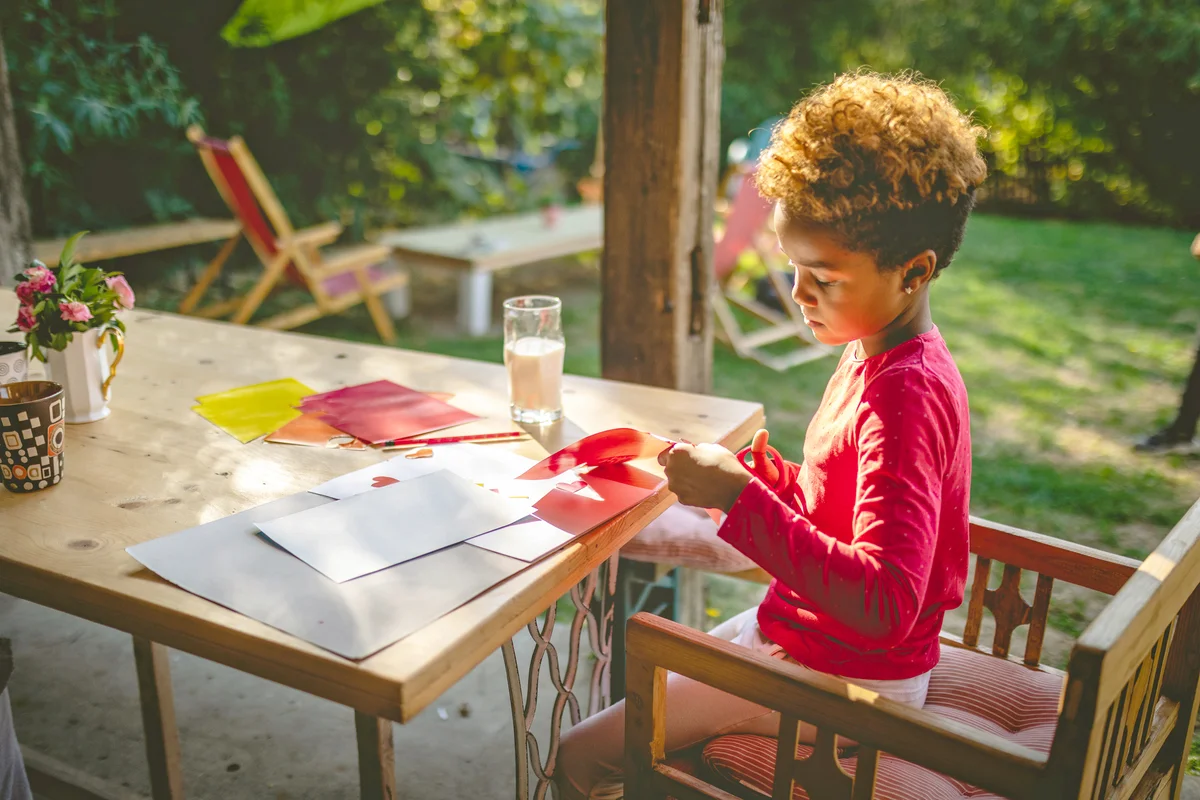Child doing a art project at home