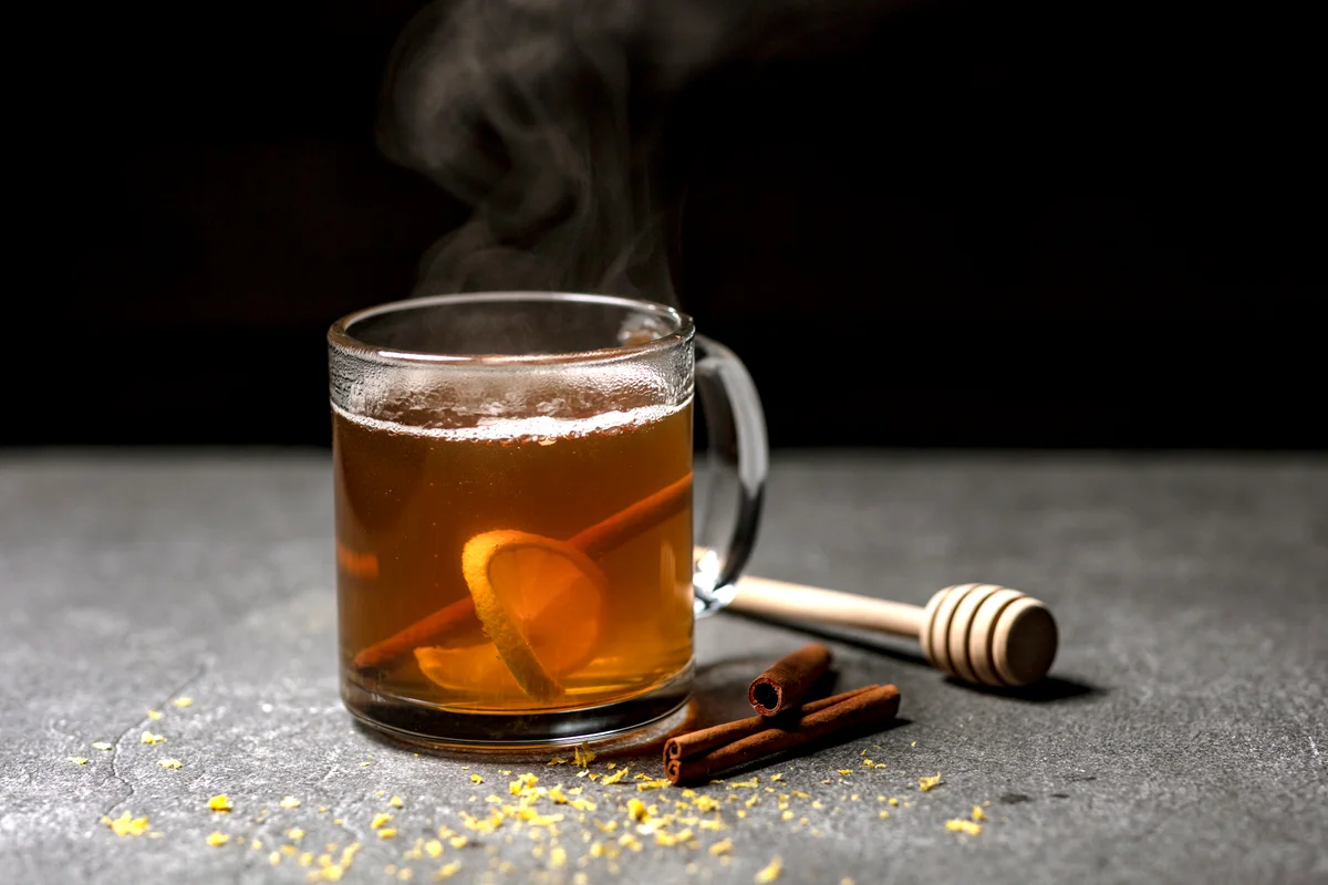 Hot toddy with lemon honey and cinnamon