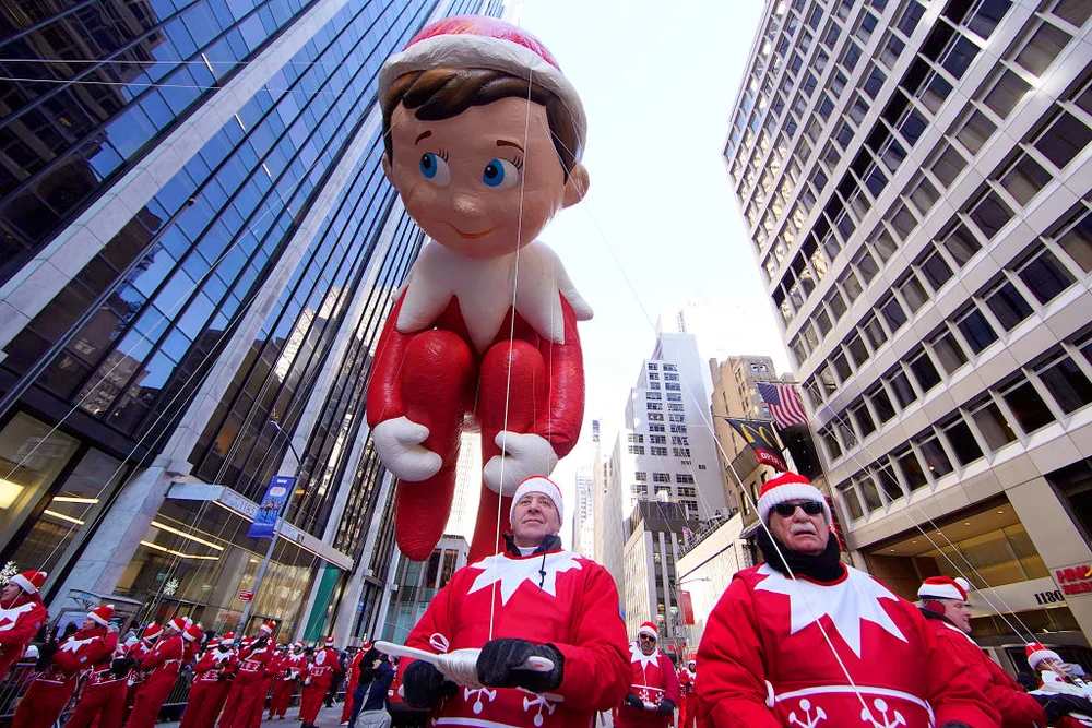 Elf on the Shelf balloon is seen during Thanksgiving Day Parade