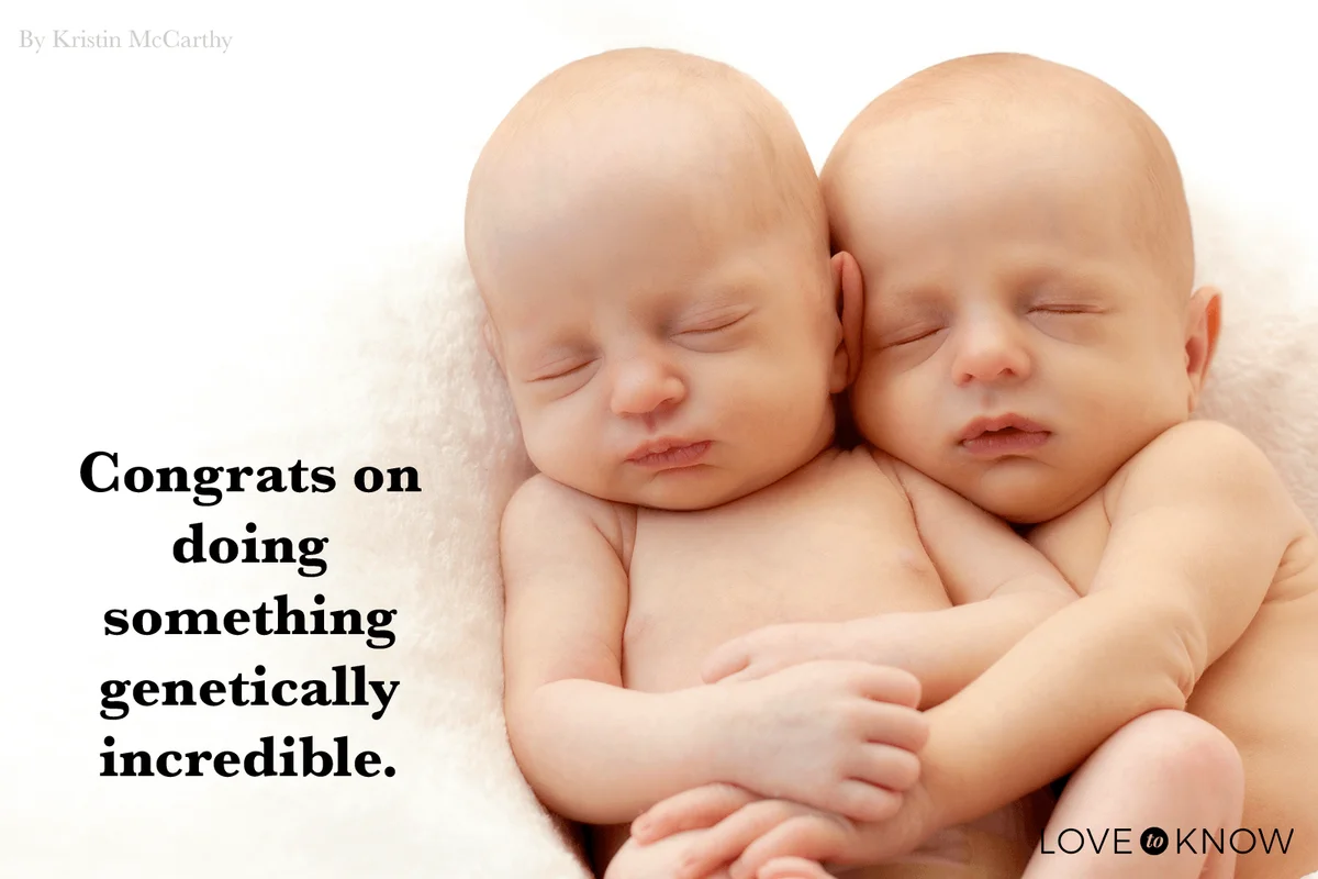 Newborn twins sleeping together