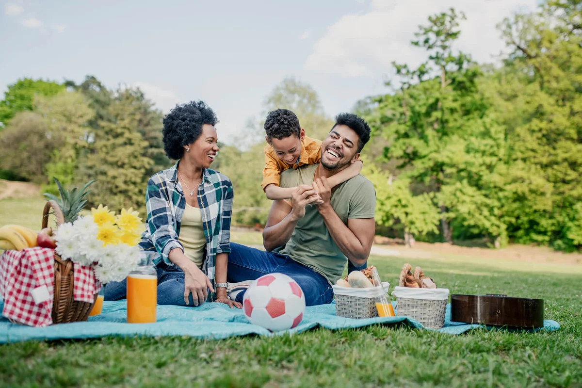 Happy family spending a spring day on picnic