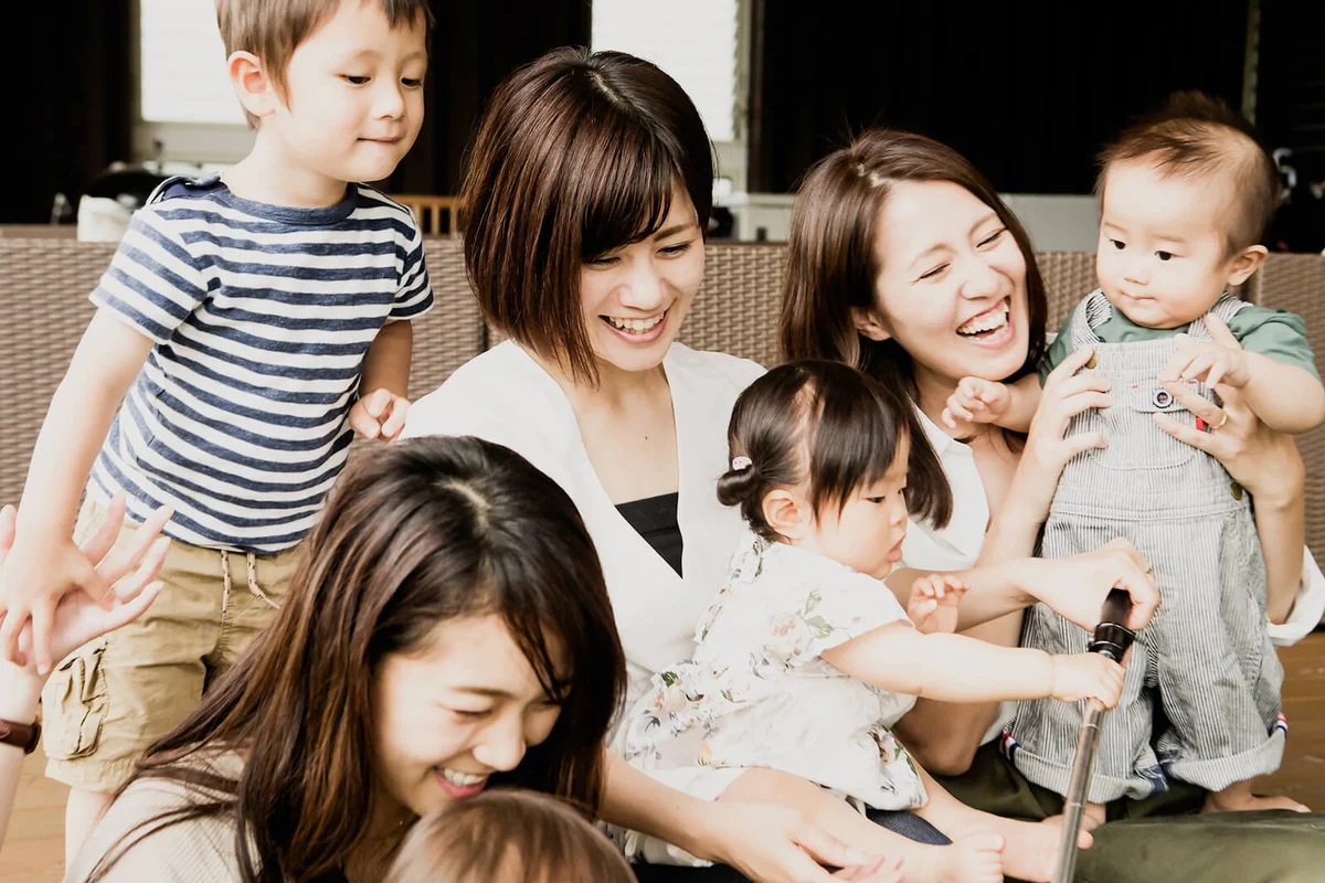 A community of mothers and children having a good time