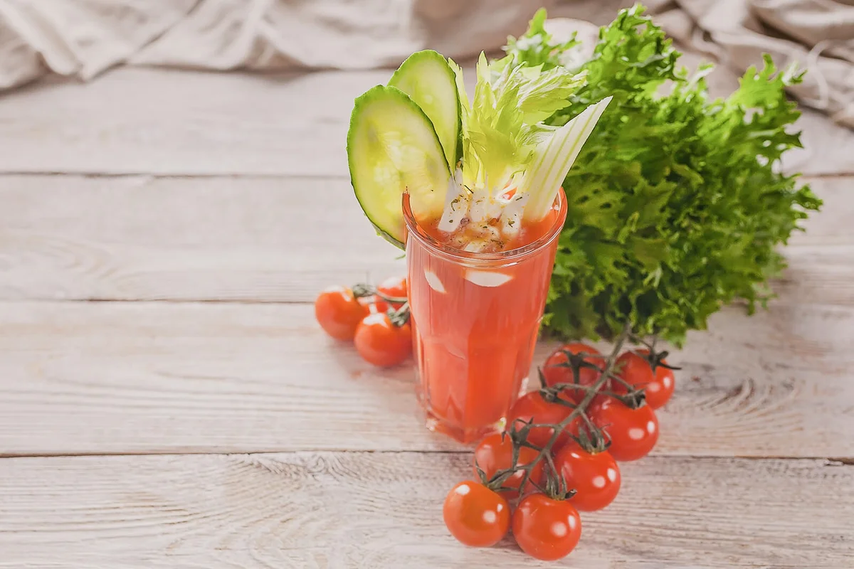 Juice, cucumber, celery sticks and seasonings