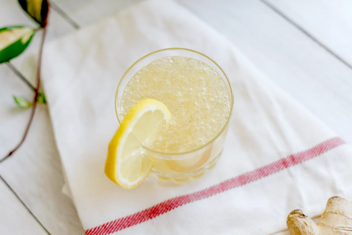 Fresh homemade ginger ale in drinking glass