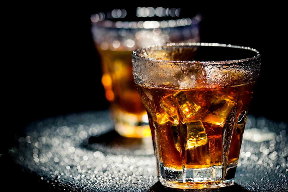 Two glasses of coke on the rocks