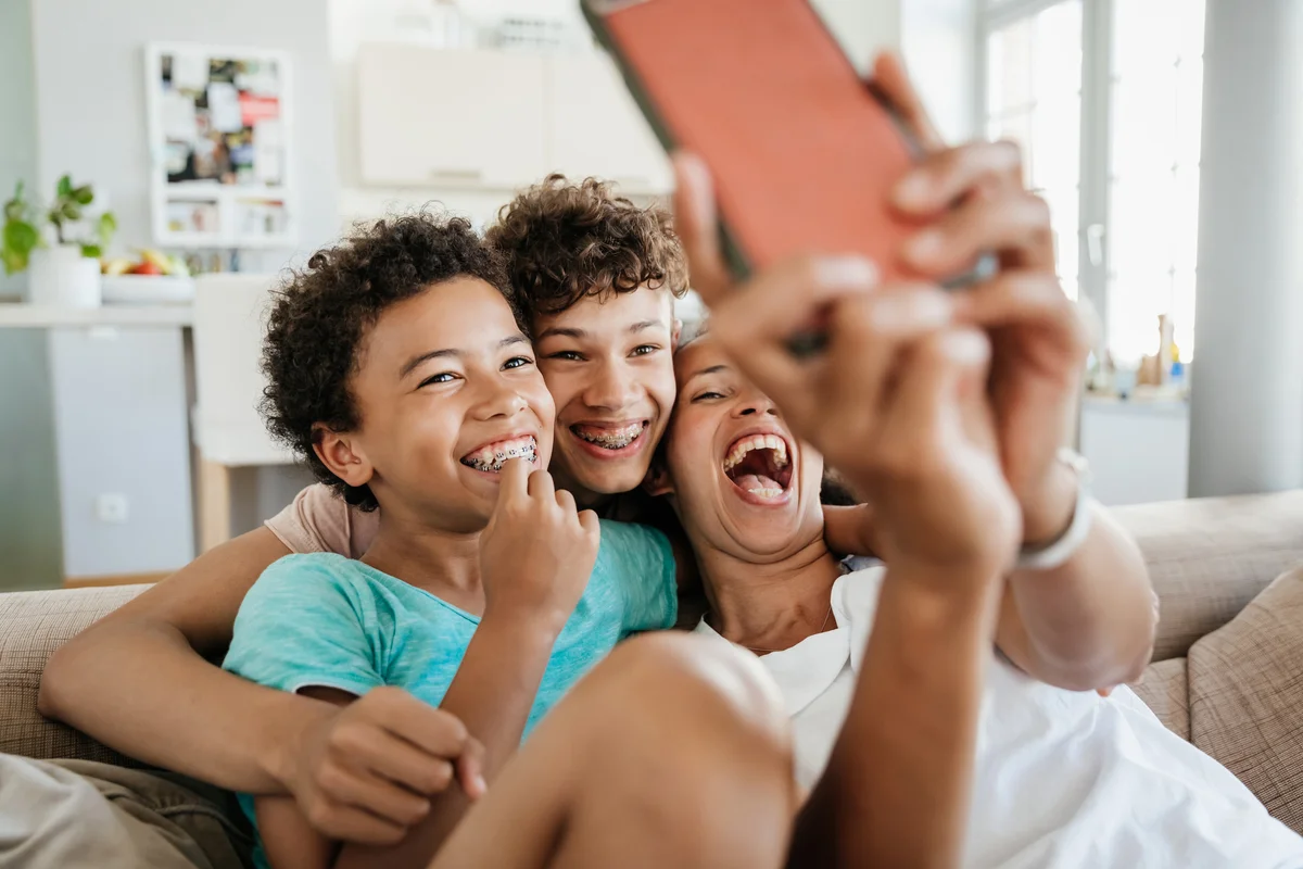 Mom Having Fun With Her Sons Taking Selfies