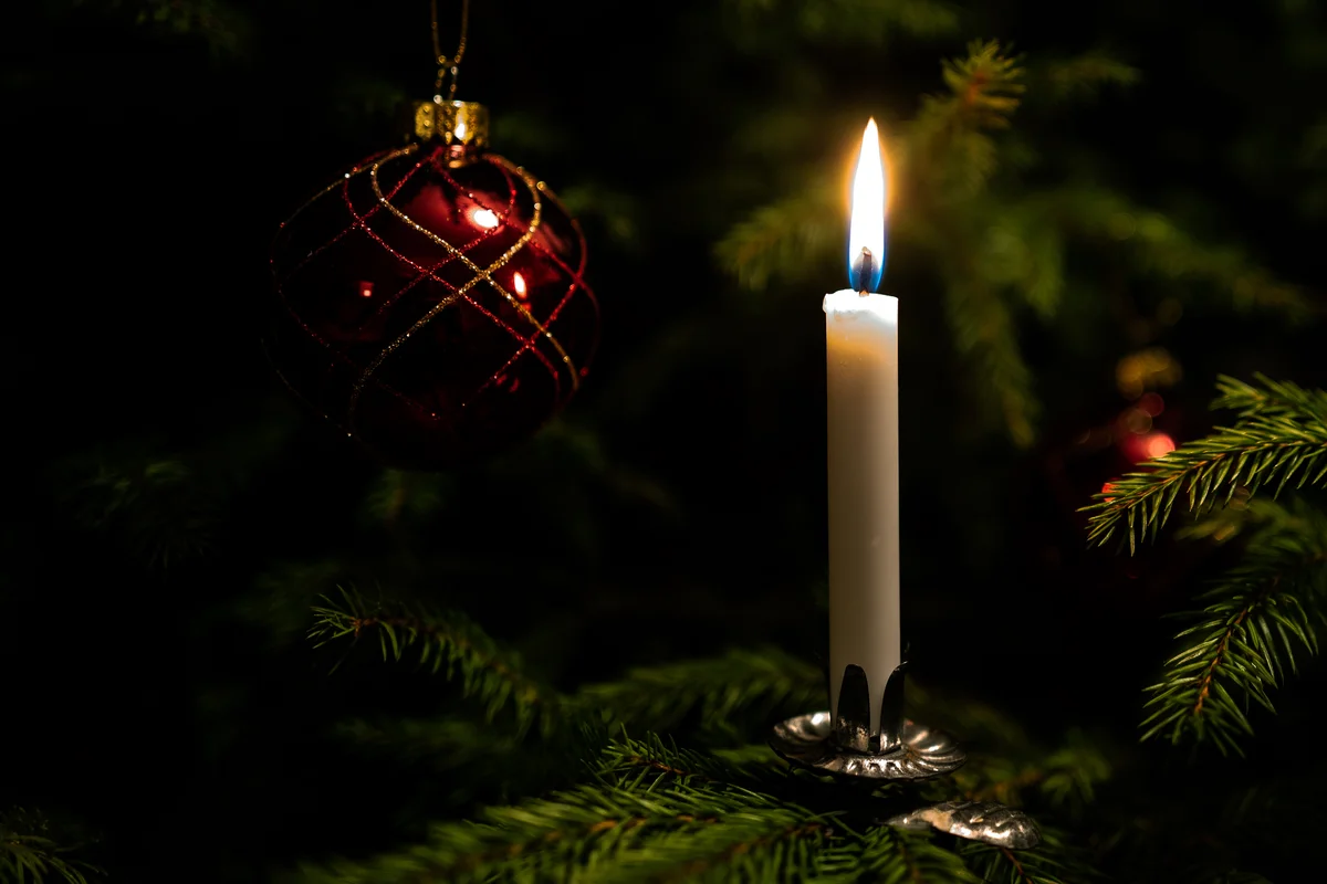 Illuminated Candle On Christmas Tree