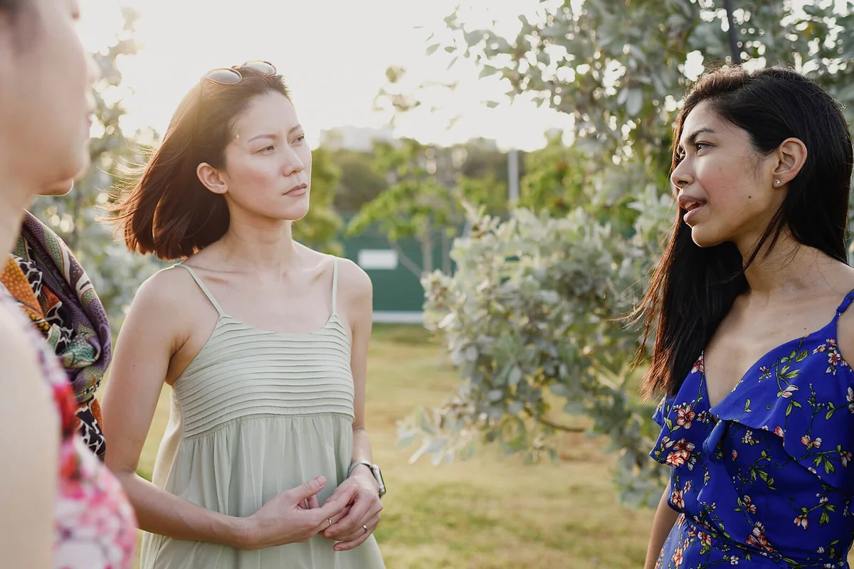 women chatting outdoors