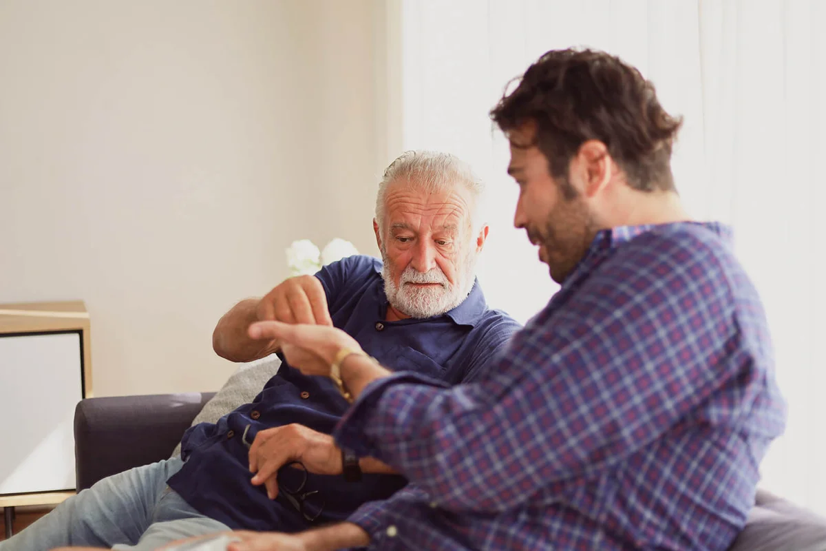 Father and son talking and sharing discussion lifestyle for domestic life at home
