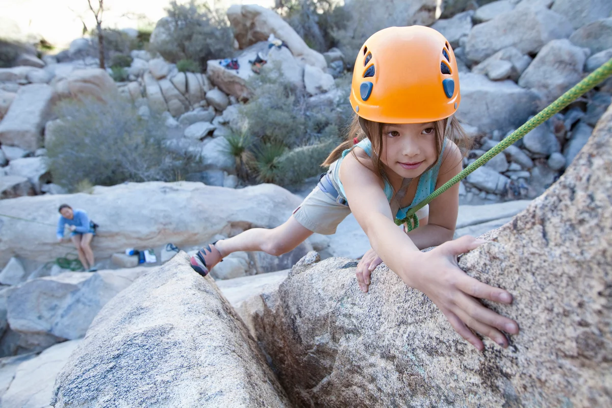 Girl rock climbing