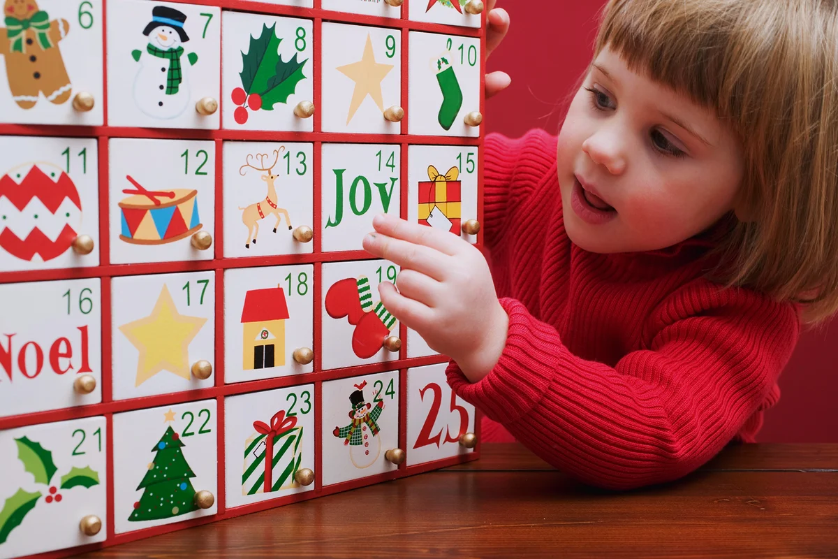 Small girl with Advent calendar