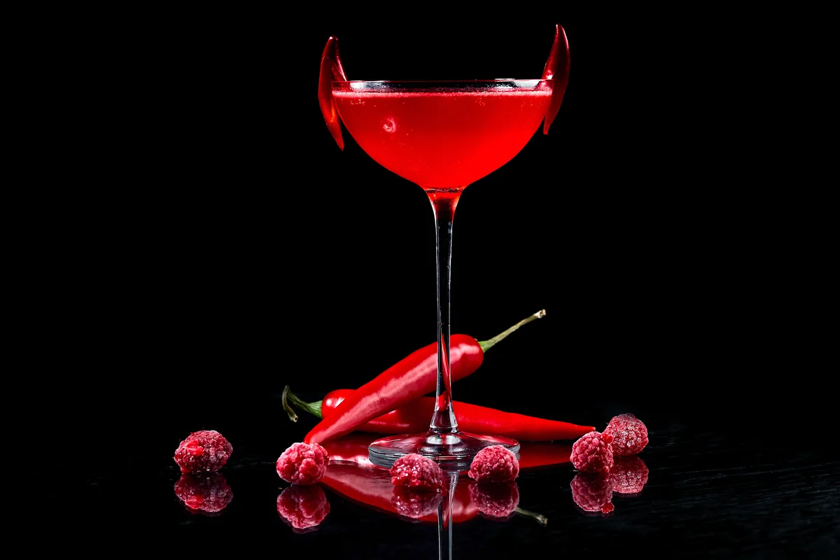 Red hot pepper and raspberries martini