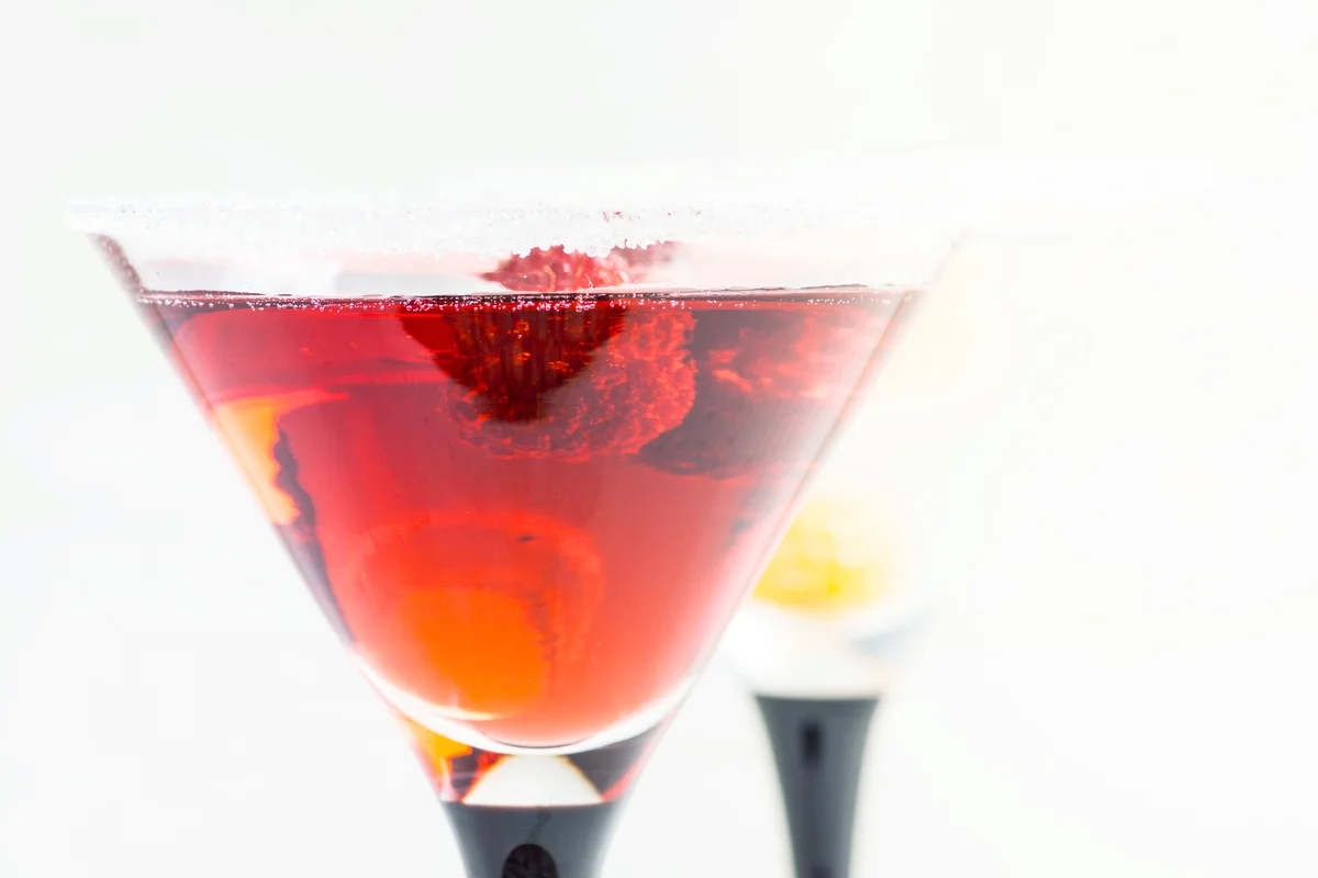 Red cocktail with raspberry