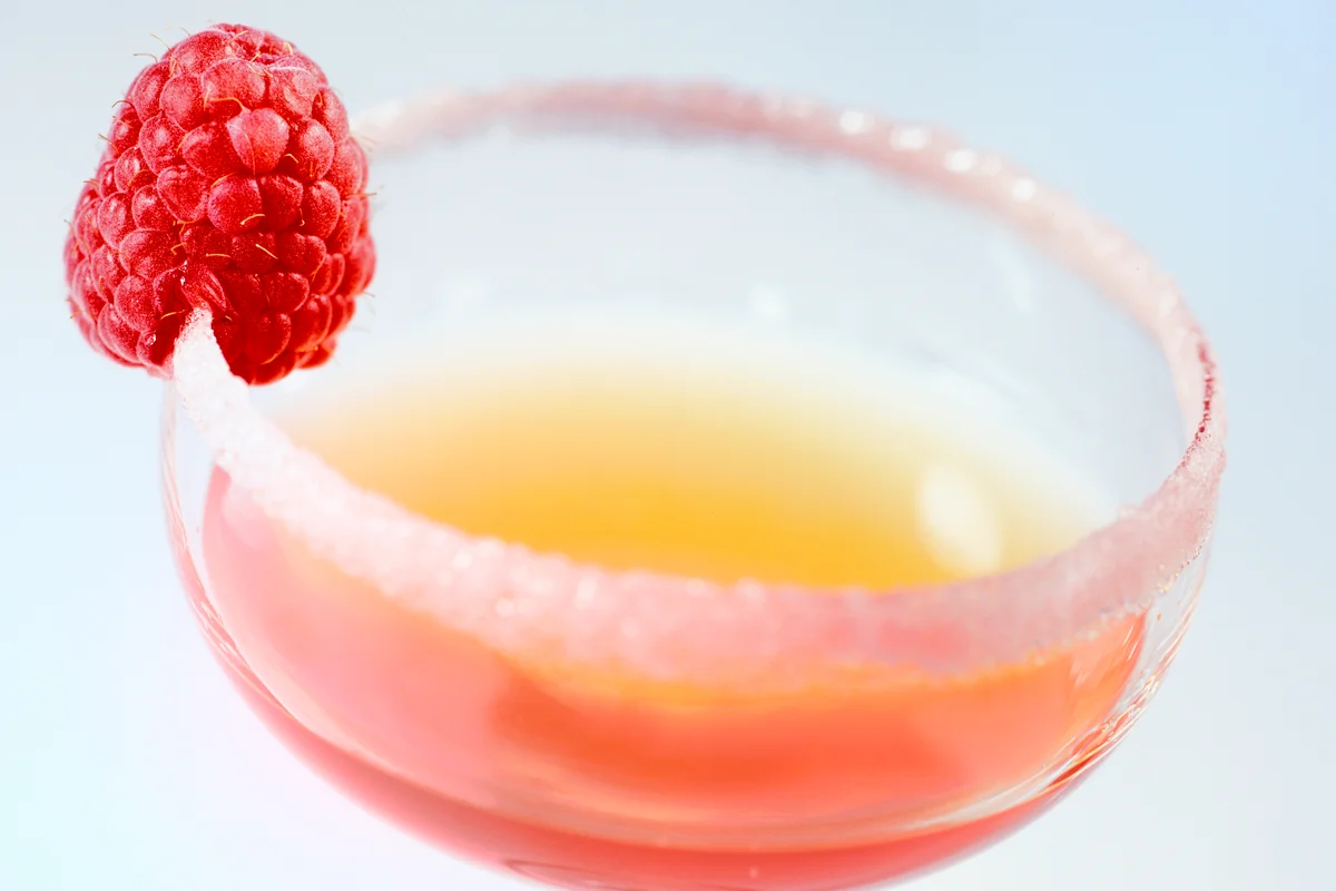 Tropical Martini cocktail in sugar coated glass