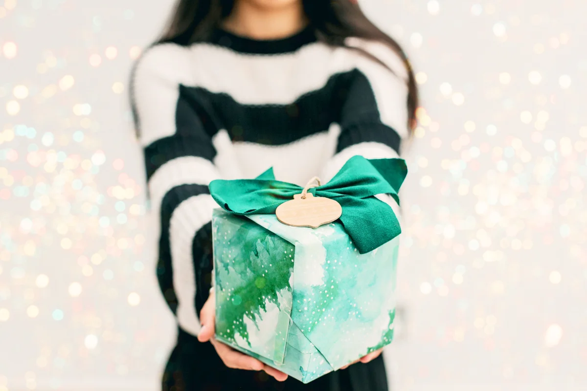 Woman holding a gift box
