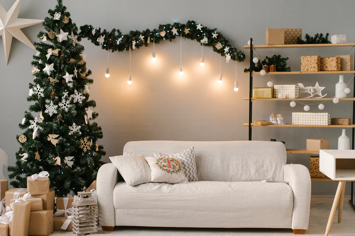 Interior of living room with Christmas decorations and present