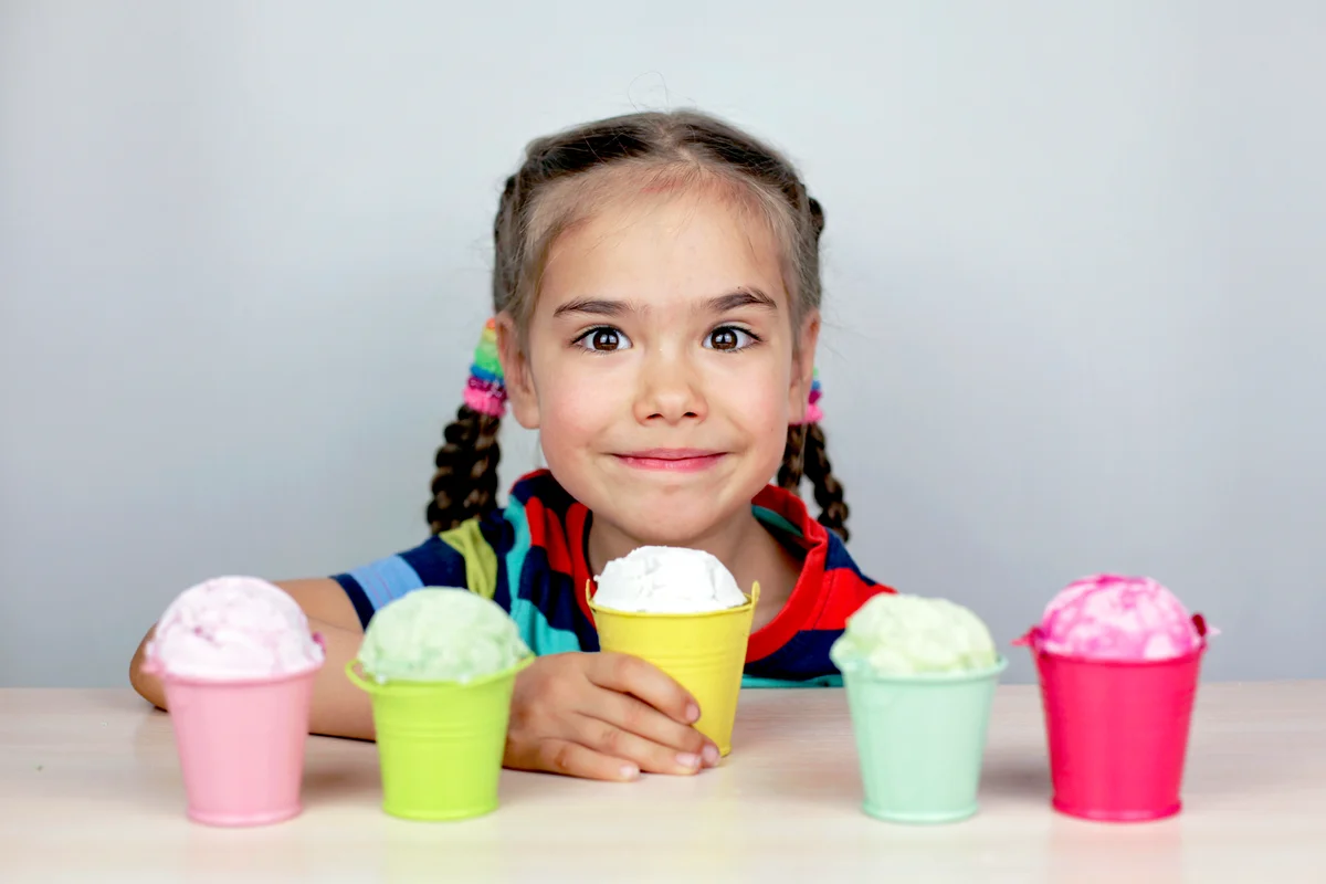 Girl choosing an ice-cream flavor