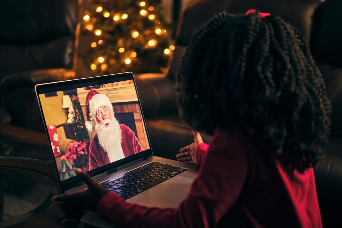 Little Girl Talking to Santa Claus on a Video Call