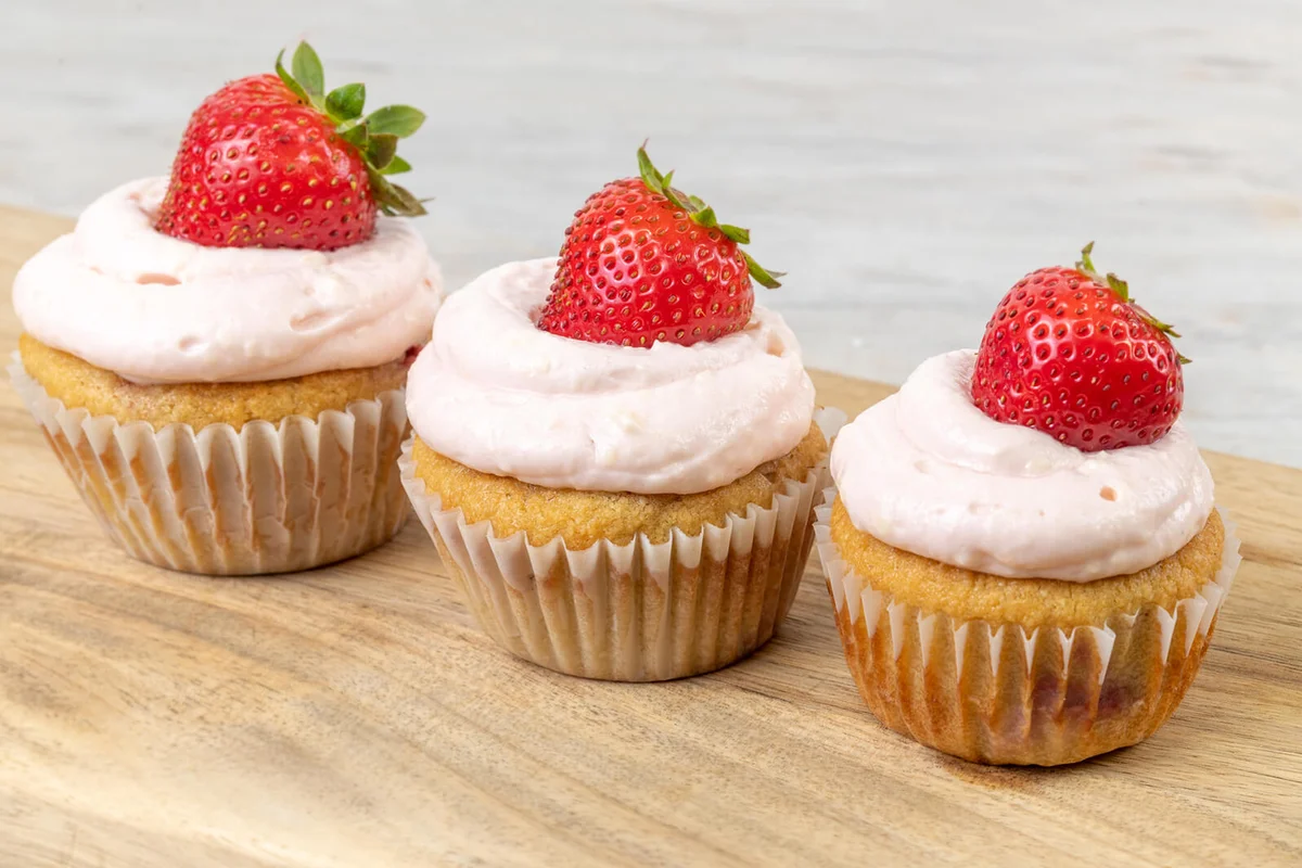 Keto muffins garnished with a strawberry