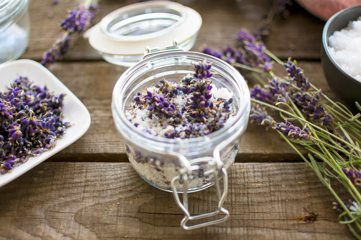 Lavender bath salt with fresh flowers in a jar
