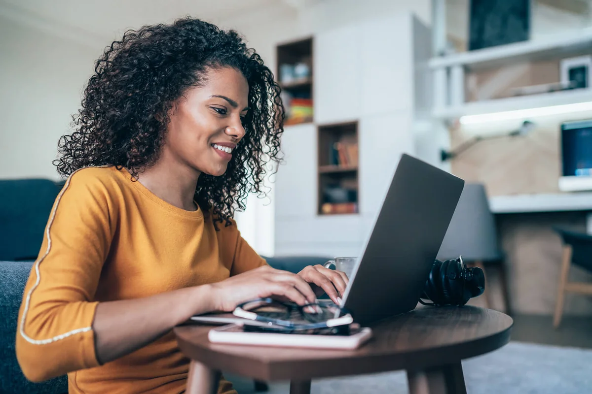 Young modern woman working from home
