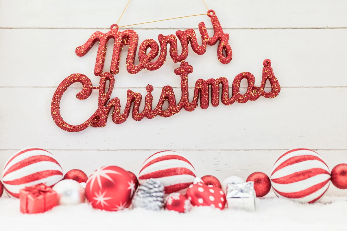 Baubles With Text On White Wall