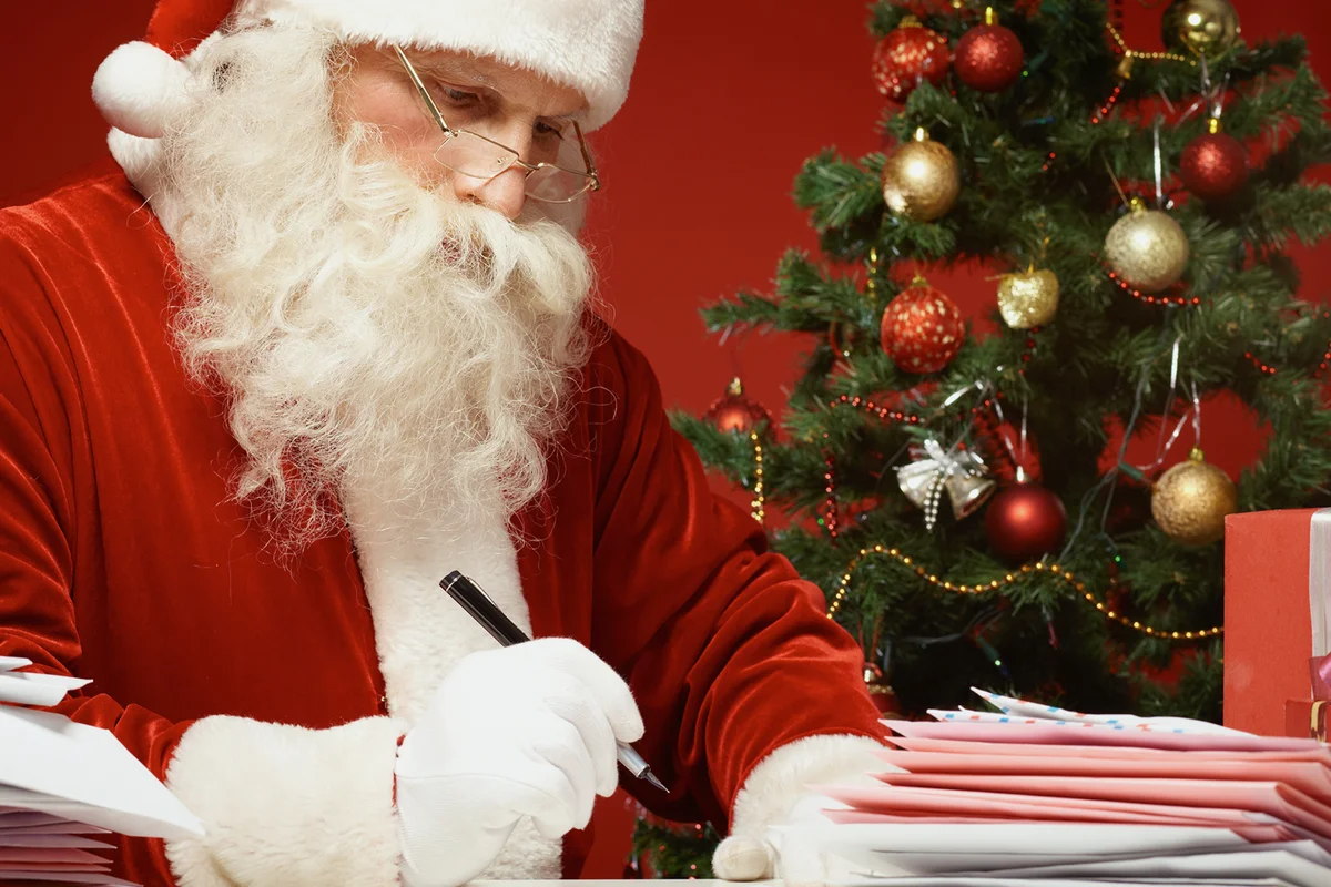 Santa Claus answering Christmas letters