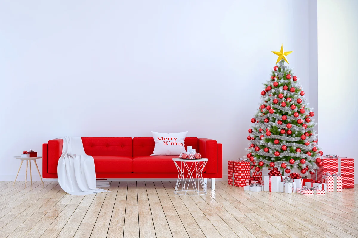 Modern Interior Of Living Room ,Red Sofa With Christmas Tree On White Wall And Wood Floor