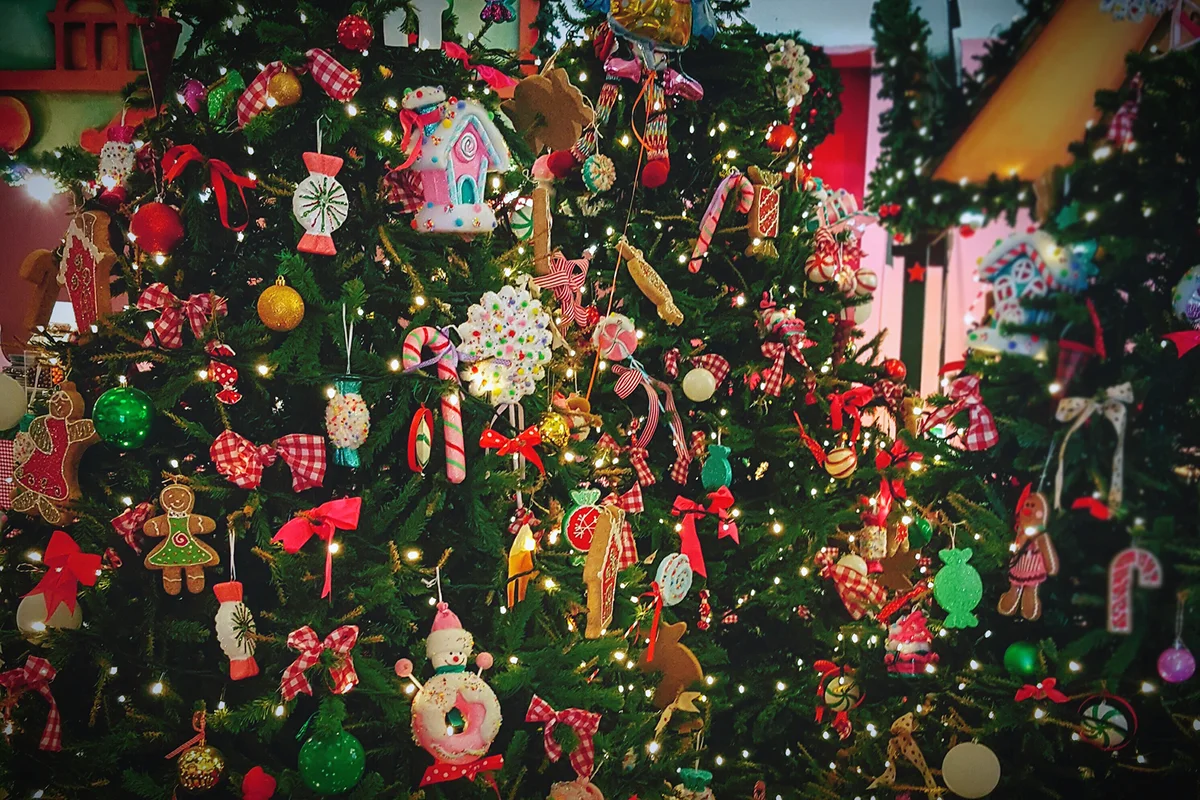 Close-Up Of Decorated Christmas Tree With Artificial Candies