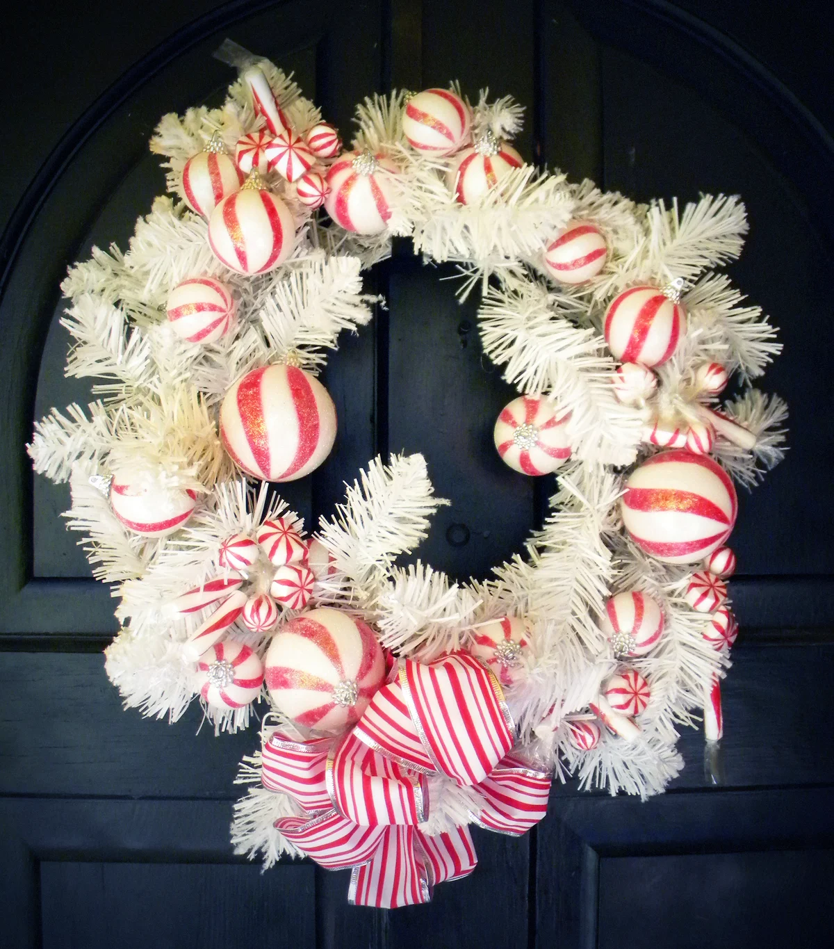 A Christmas Wreath decorated with peppermints
