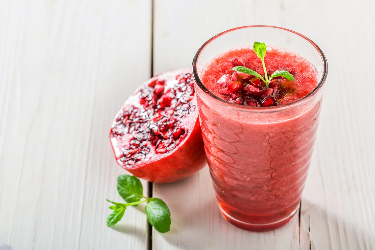 Yummy cocktail made of fresh pomegranate, watermelon and mint