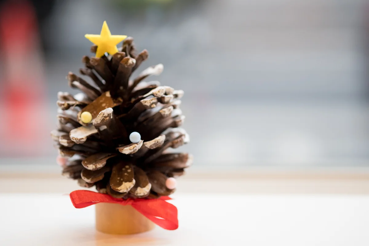 Miniature Christmas tree made on pinecone