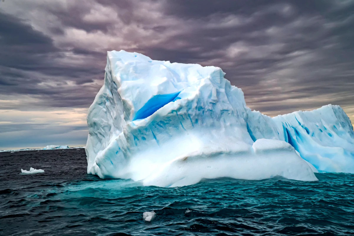 Melting Iceberg with ice floes