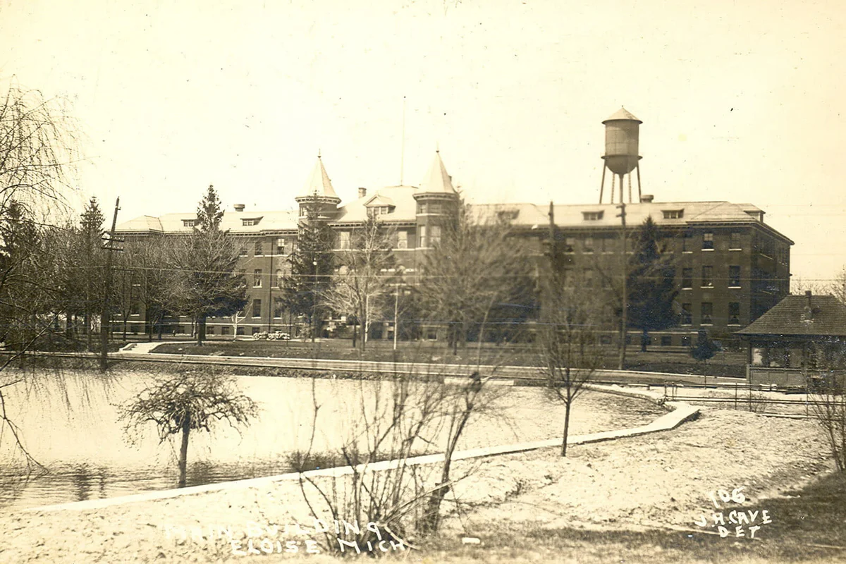 Westland MI Main Bldg for Eloise Insane Asylum & Poorhouse, Farm & Hospital 1911 RPPC Photographer JH Cave Card 106 Water Tower behind E Bldg built 1868