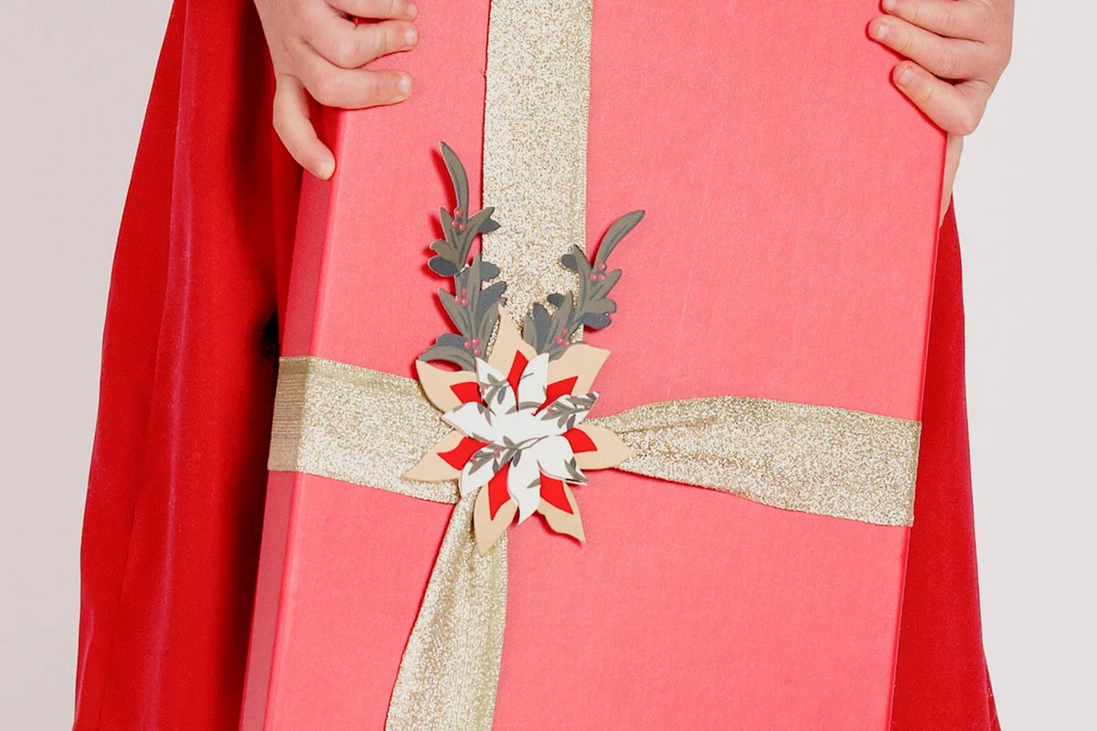 girl holding gift behind her back