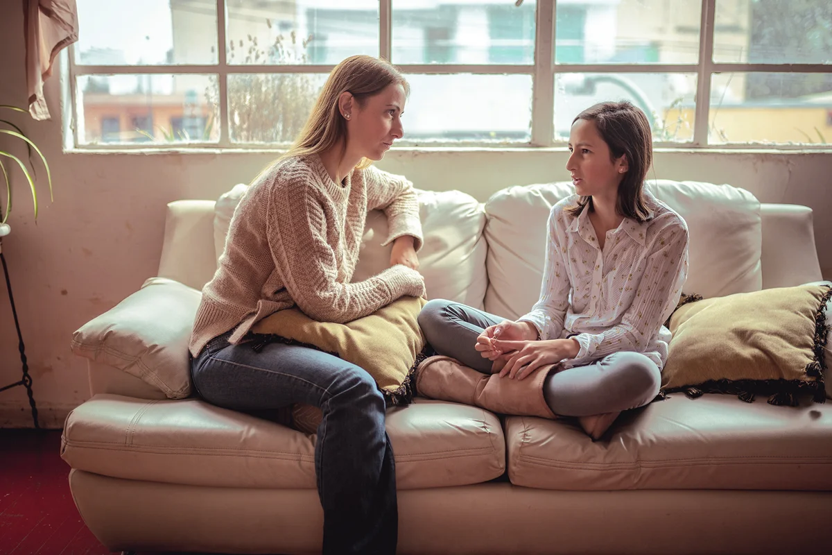 Mother listening to daughter