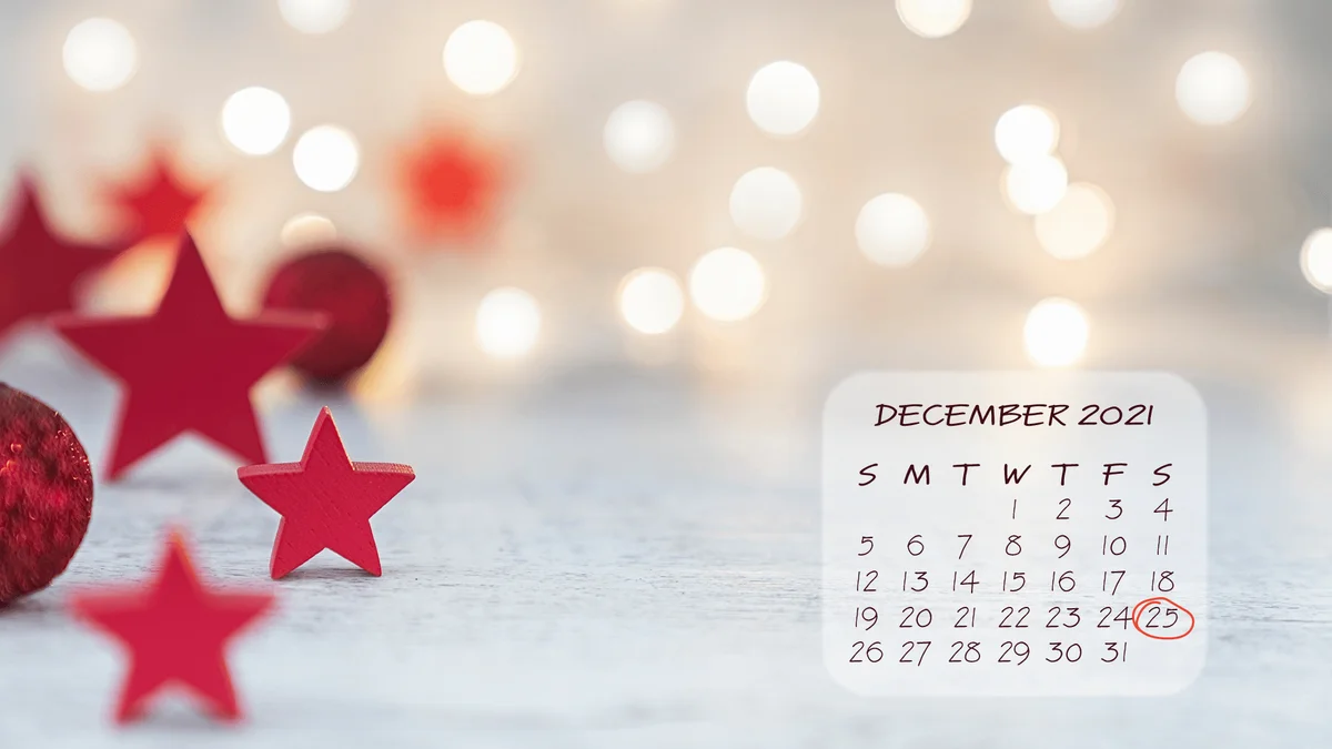 Christmas wallpaper with red stars and red christmas balls with fairy lights - desktop
