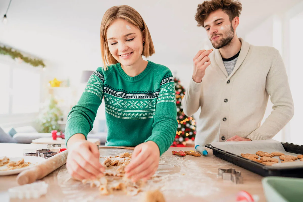 couple baking together for Christmas