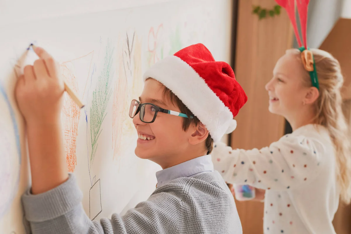 Boy and Girl Drawing on Walls on Christmas